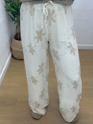 Pantalón beige flor